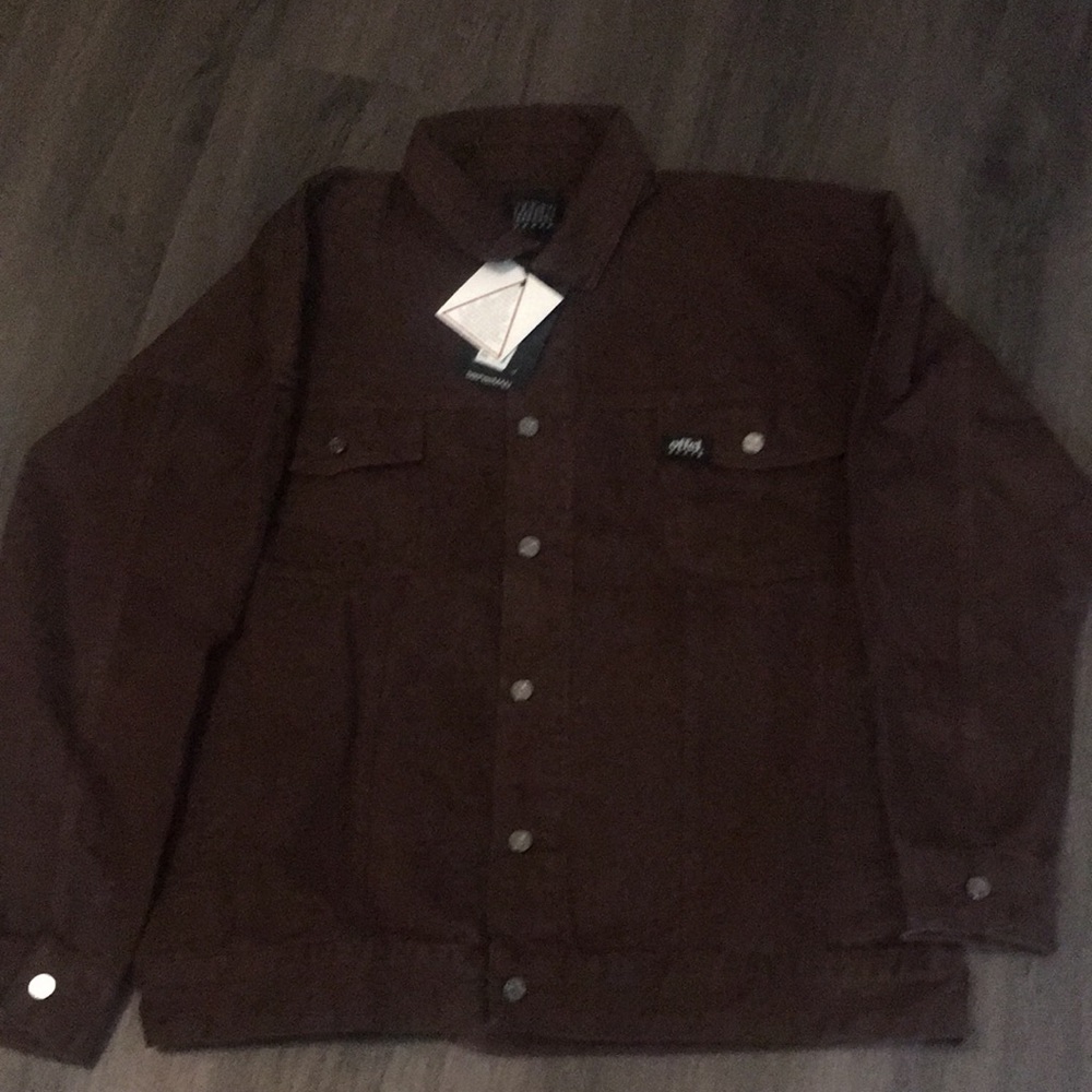 a brown jean jacket